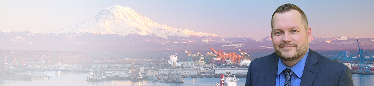 Profile picture of Matthew J. Yetter, set against a background featuring a pier and snow-capped mountains.