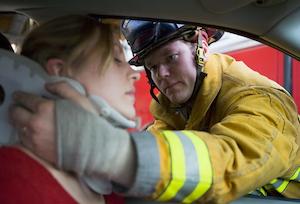 Firefighters Helping Injuried Woman