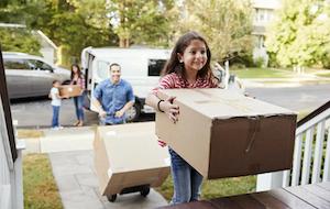 Children Helping Unload Boxes