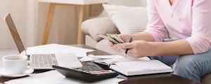 Woman Counting Money Bills